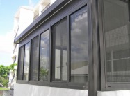 Beach lanai enclosed with impact-resistant windows and doors - Fort Myers, FL