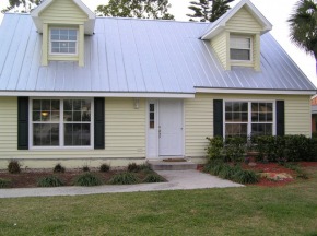 Project: Vinyl siding, replacement windows, dormers and dormer windows added to roofline, new metal roof - Naples, FL